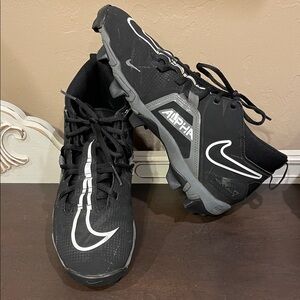 Nike Alpha Black and White Sports Cleats